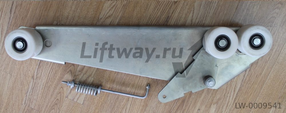 Каретка прижимного ремня поручня правая эск. Schindler 9300